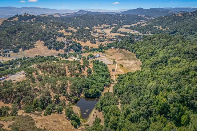 an aerial view of residential house and outdoor space