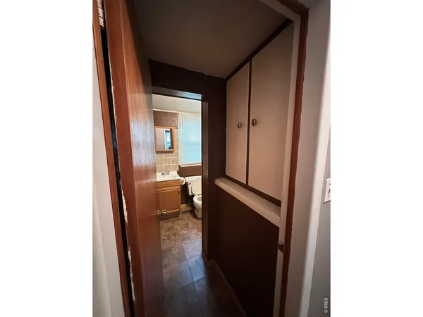 a view of an empty walk in closet