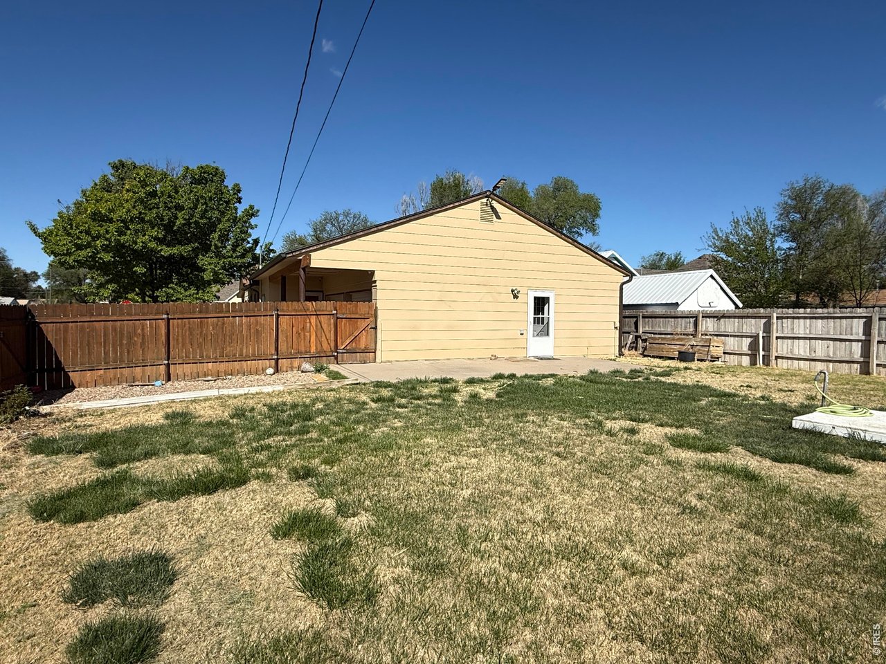 711 South 3rd Street Lamar, CO 81052 - Photo 29 of 30 a view of a house with a yard