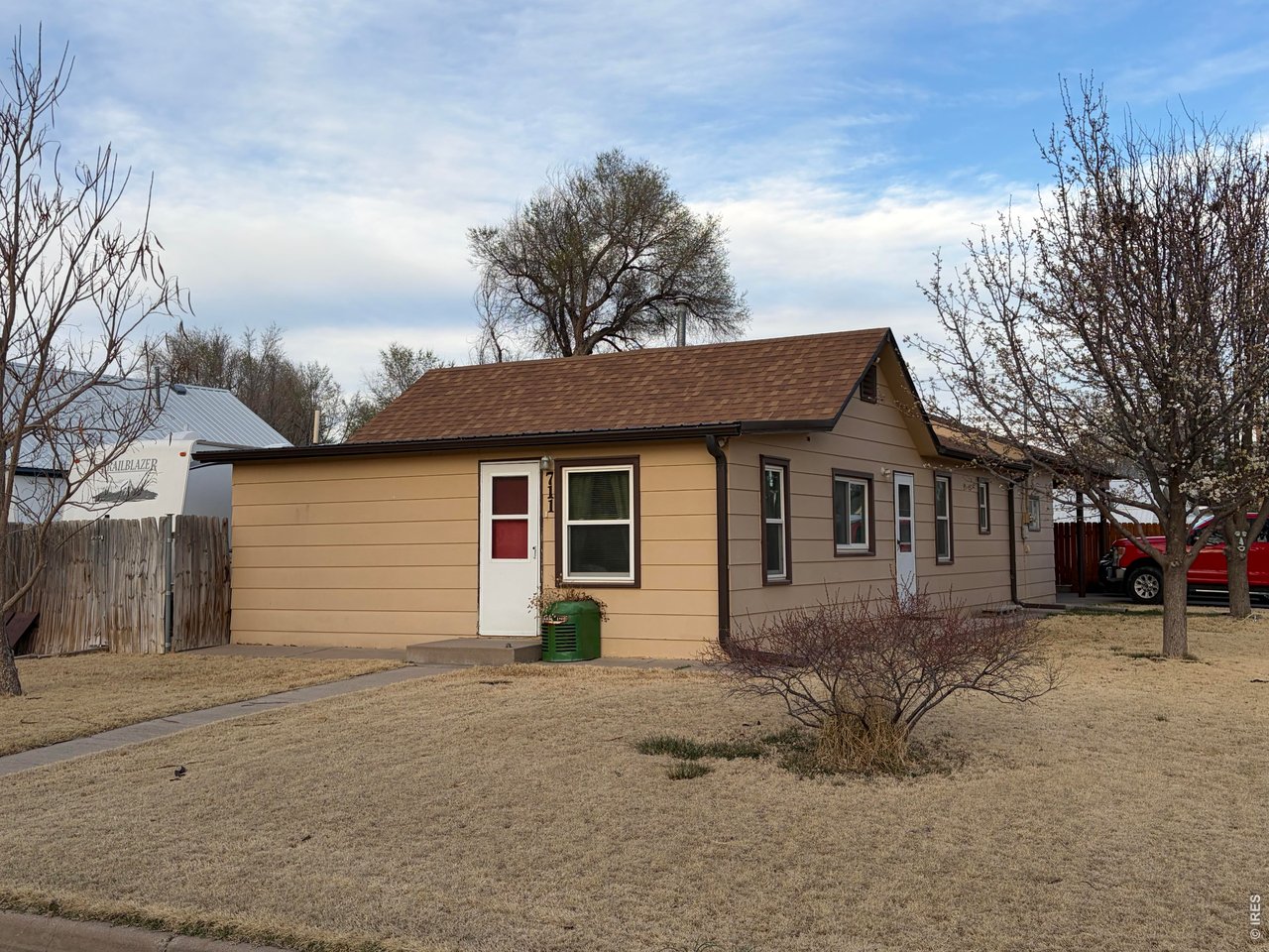 711 South 3rd Street Lamar, CO 81052 - Photo 30 of 30 a front view of a house with a yard