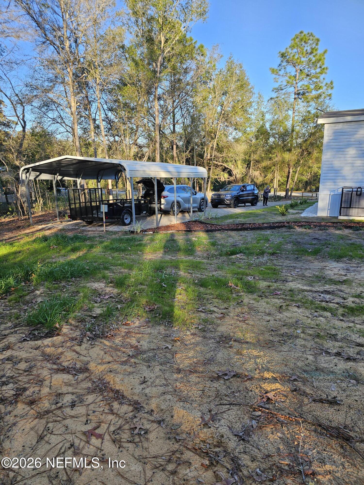 295 Baden Powell Road Hawthorne, FL 32640 - Photo 6 of 15 a view of house with yard and entertaining space