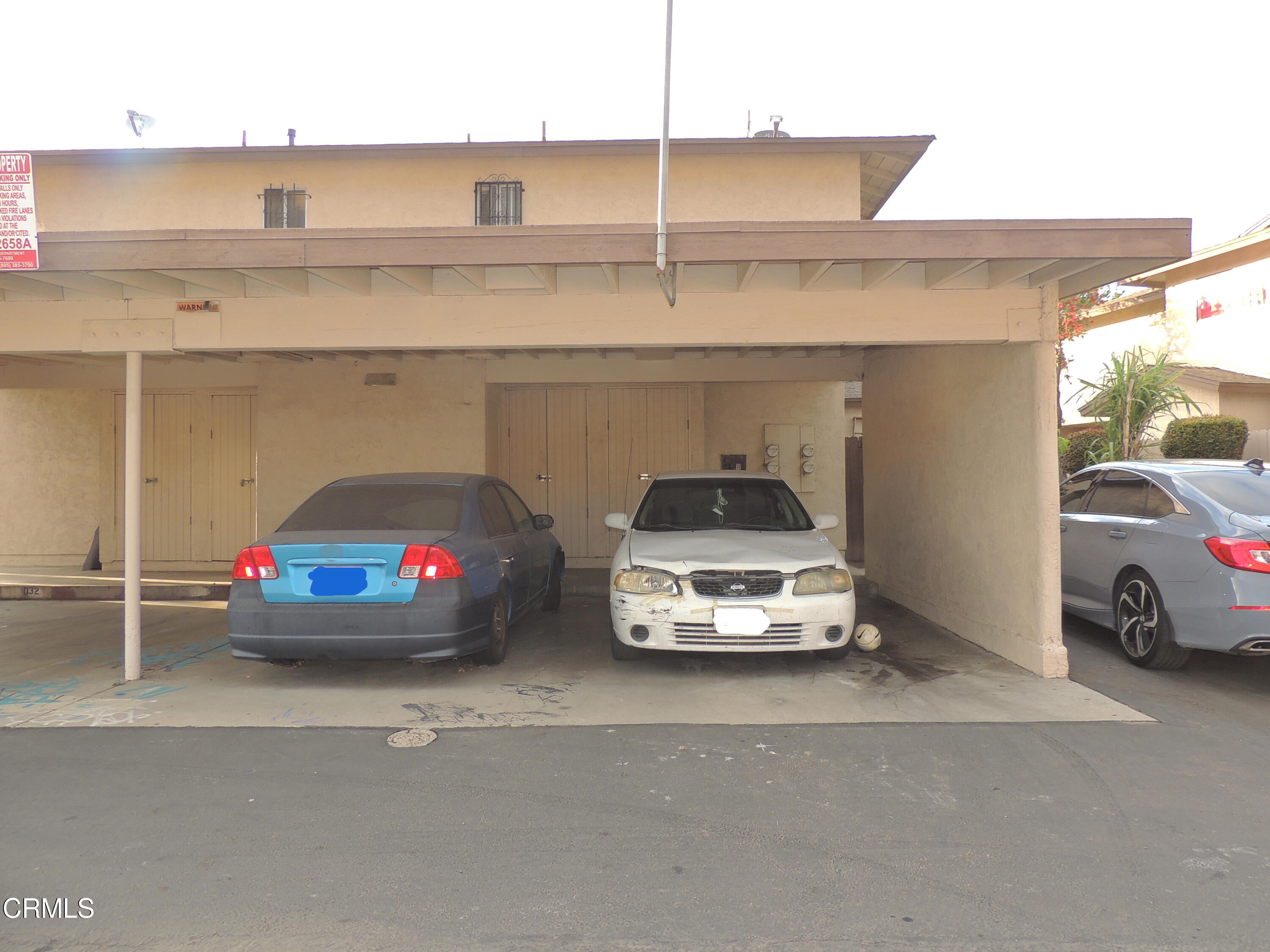 1036 Cheyenne Way Oxnard, CA 93033 - Photo 3 of 11 a car parked in parking