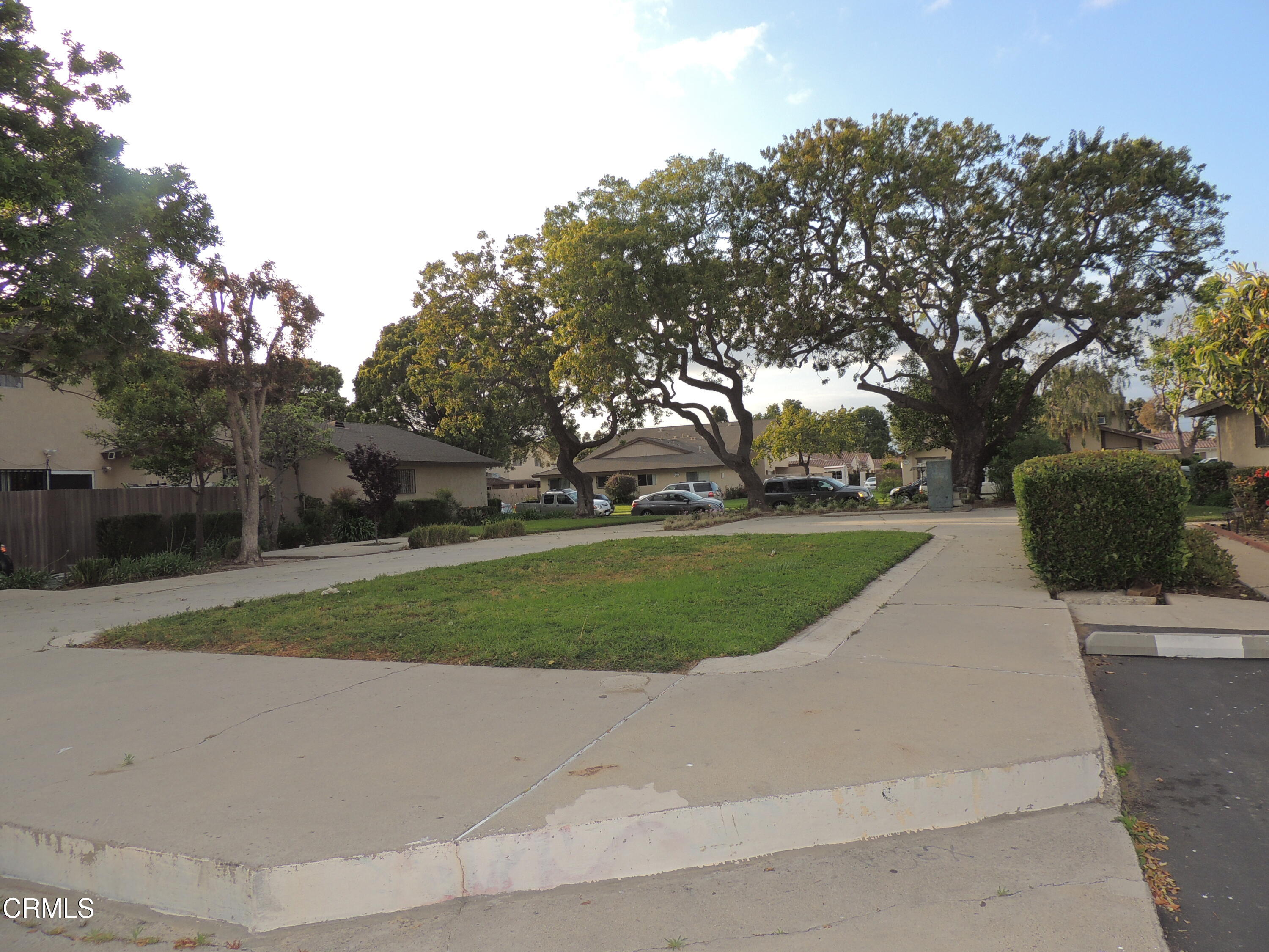 1036 Cheyenne Way Oxnard, CA 93033 - Photo 9 of 11 a view of a park with large trees