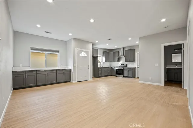 a view of kitchen and a window