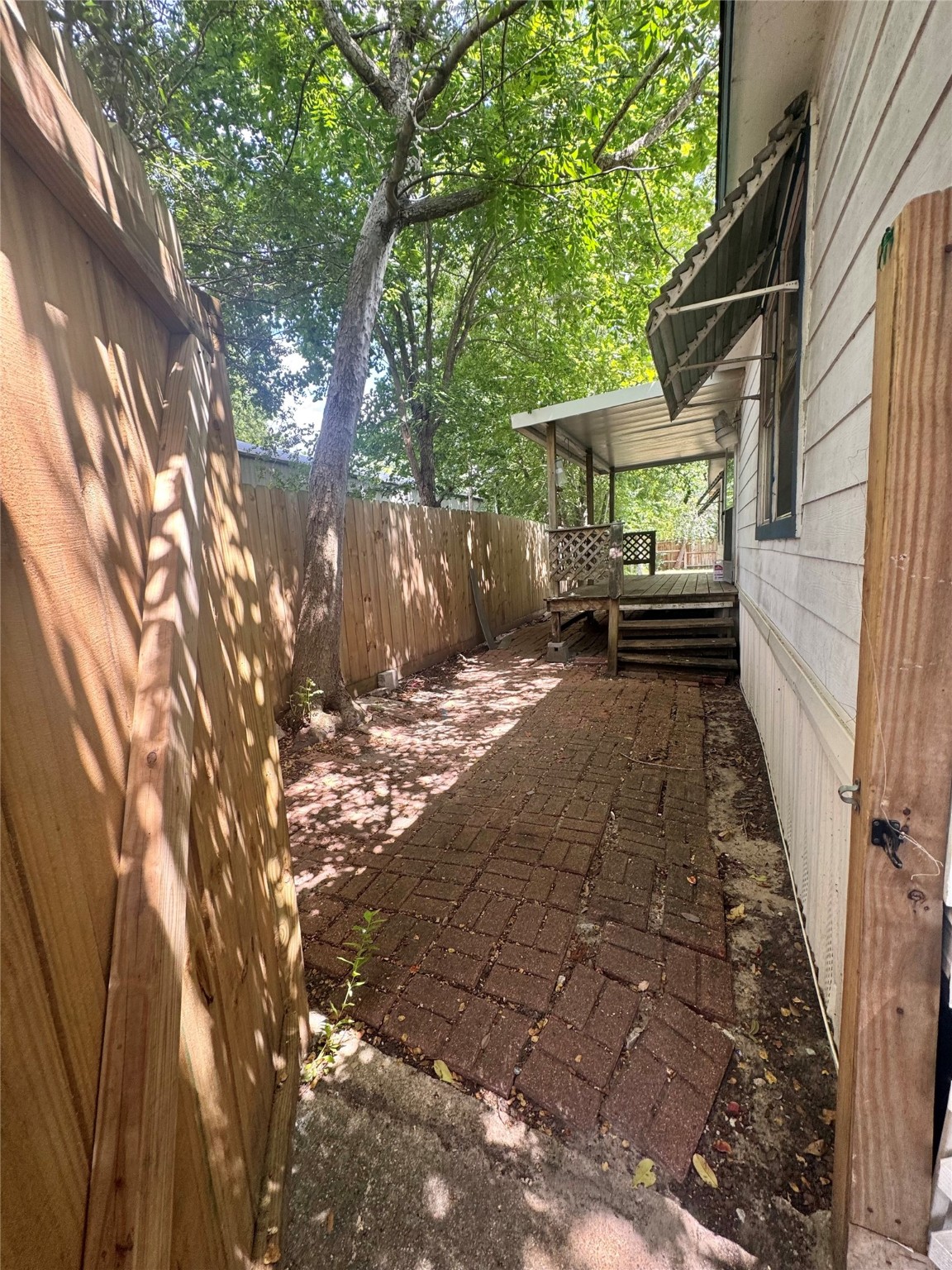 1021 Tealway Drive Pasadena, TX 77504 - Photo 3 of 18 a view of a house with a yard
