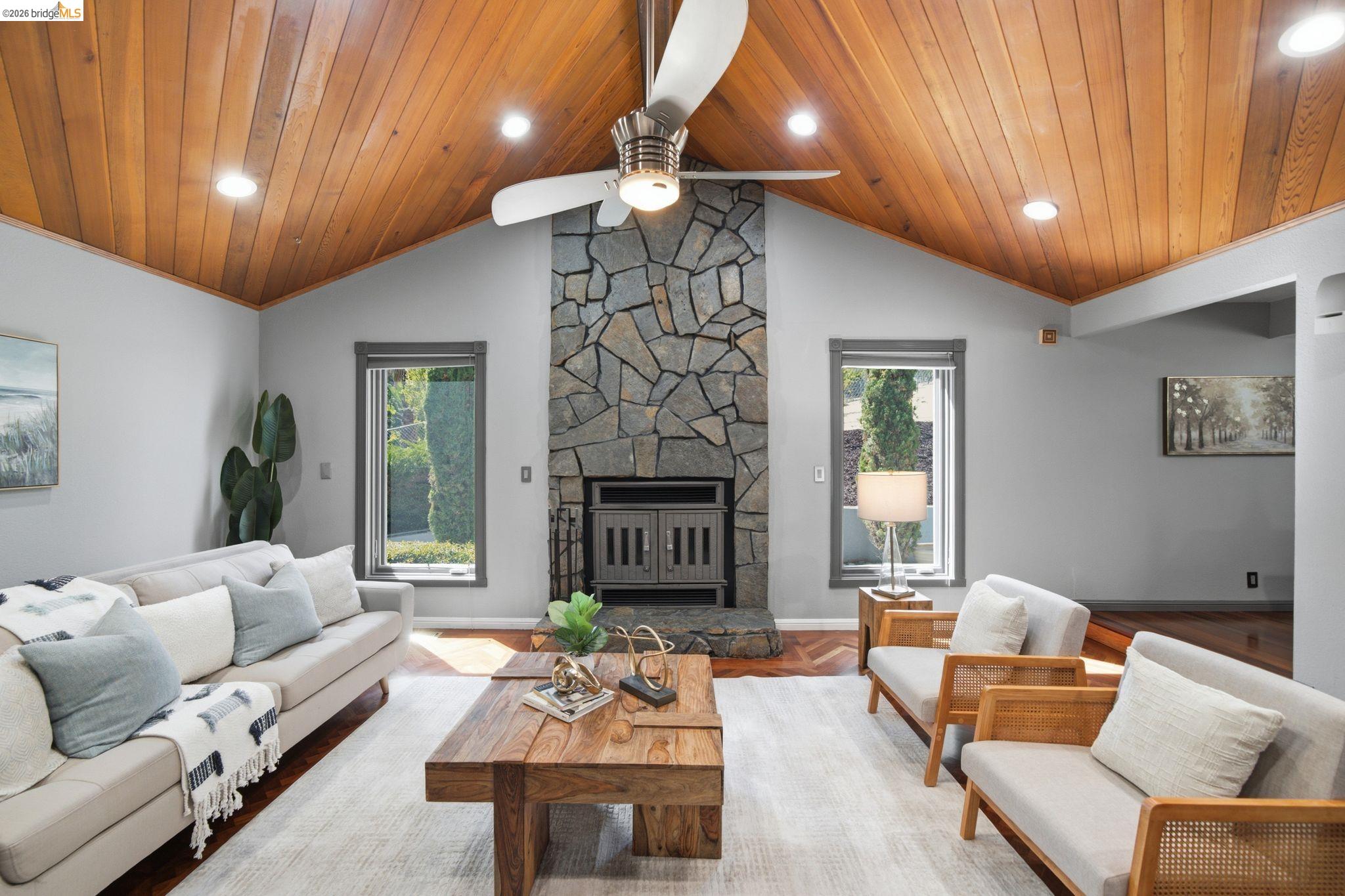 11133 Golf Links Road Oakland, CA 94605 - Photo 21 of 57 Vaulted wood-paneled ceiling with recessed lighting and a ceiling fan