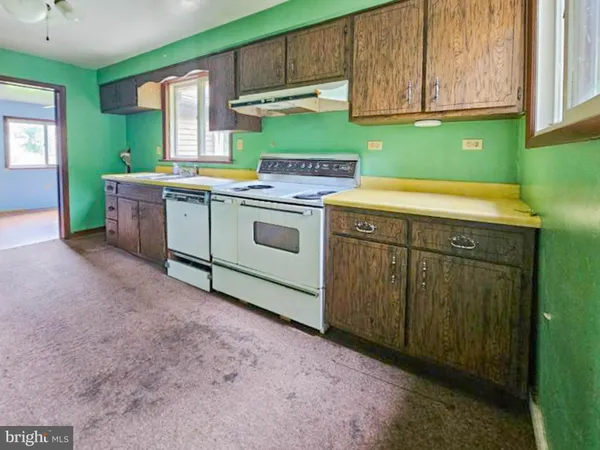 a utility room with washer and dryer