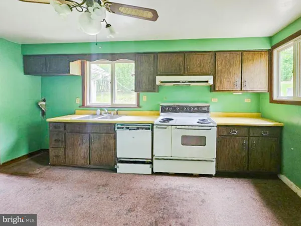 a utility room with washer and dryer