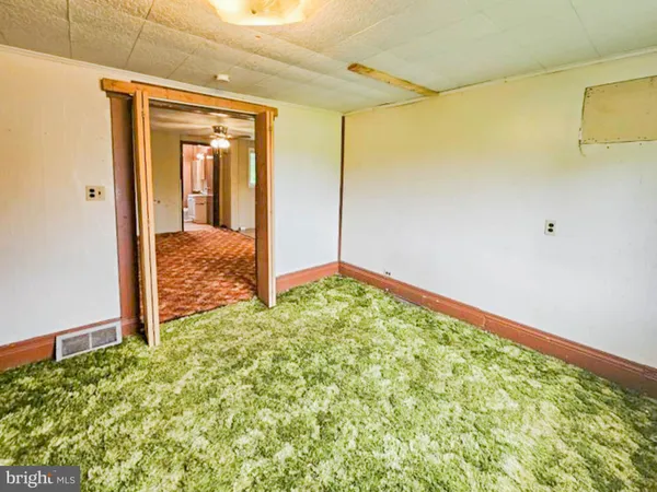 a view of an empty room with window