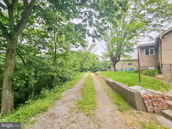 a view of a backyard with a garden