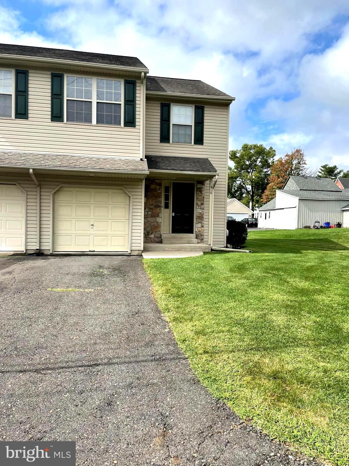 910 Vine Street Perkasie, PA 18944 - Photo 1 of 34 a front view of a house with garden