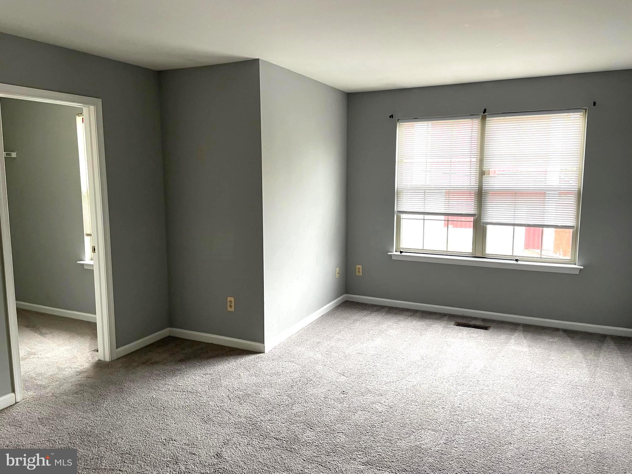 910 Vine Street Perkasie, PA 18944 - Photo 13 of 34 an empty room with windows and closet