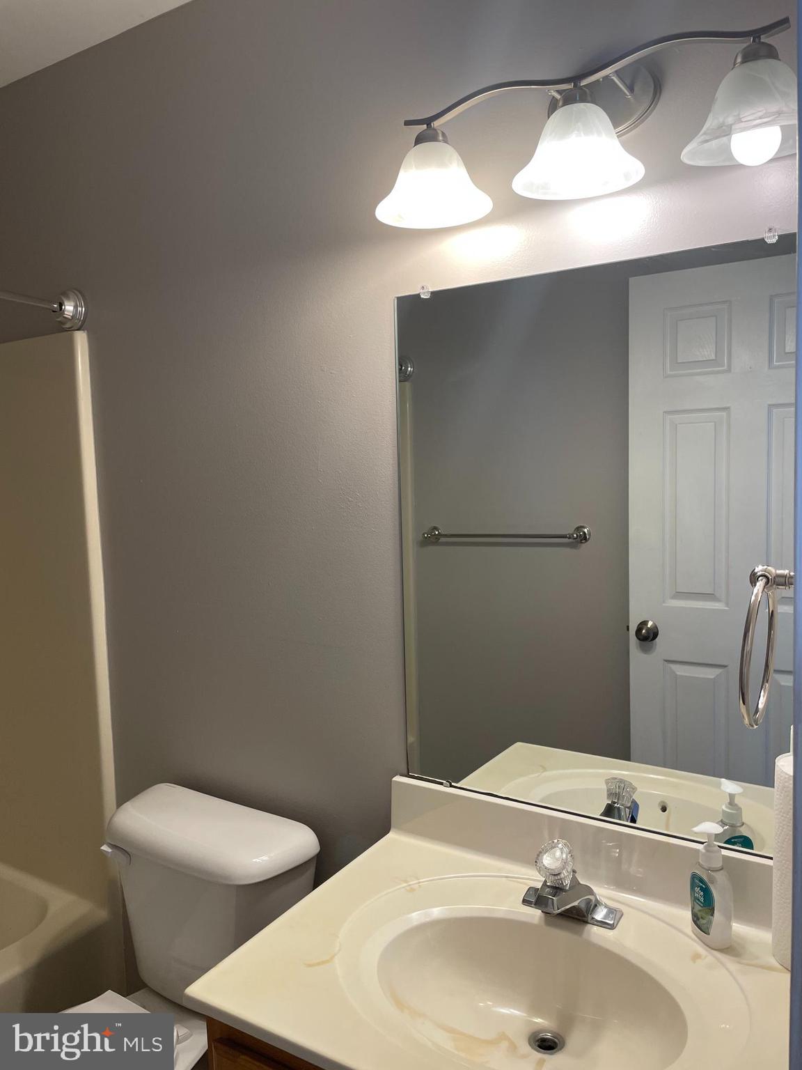 910 Vine Street Perkasie, PA 18944 - Photo 19 of 34 a bathroom with a sink and a mirror