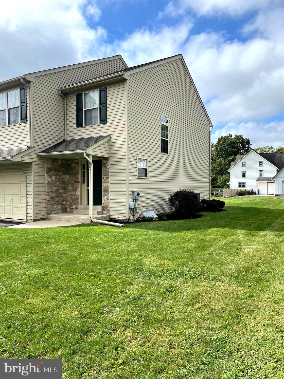910 Vine Street Perkasie, PA 18944 - Photo 28 of 34 a view of a house with a backyard