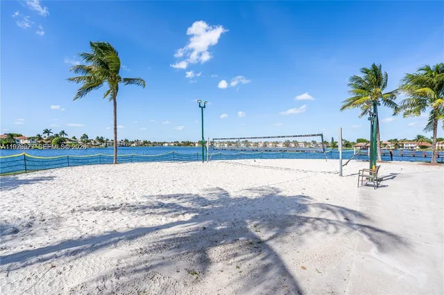a view of a swimming pool and a yard