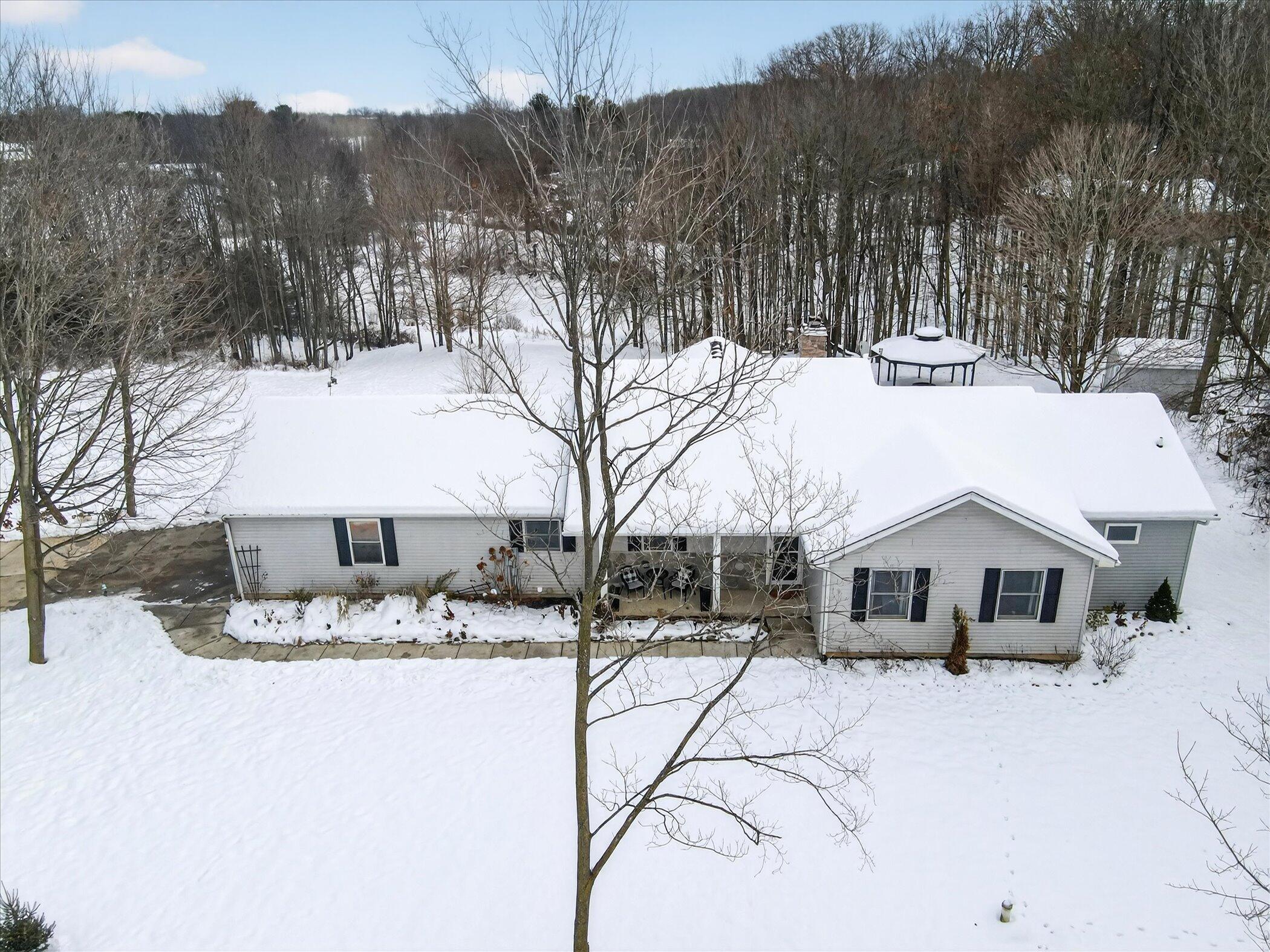 1395 South Lacey Lake Road Charlotte, MI 48813 - Photo 7 of 77 11-1395 S Lacey Lake Rd-WindowStill-Phot