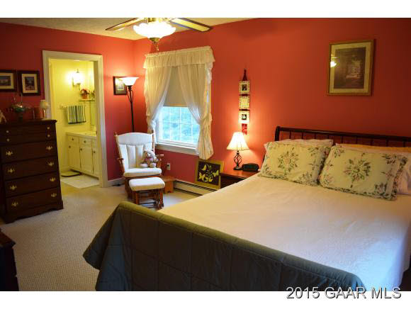 739 Cattle Scales Road Waynesboro, VA 22980 - Photo 16 of 36 a bedroom with furniture and a lamp