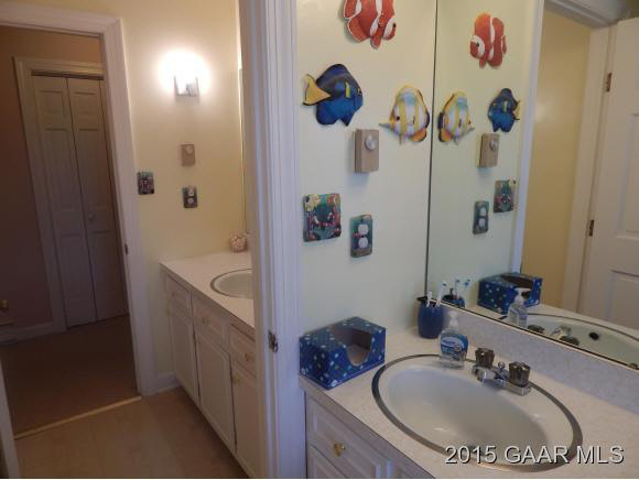 739 Cattle Scales Road Waynesboro, VA 22980 - Photo 24 of 36 a bathroom with a sink mirror and shower
