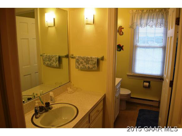 739 Cattle Scales Road Waynesboro, VA 22980 - Photo 25 of 36 a bathroom with a sink mirror vanity and toilet