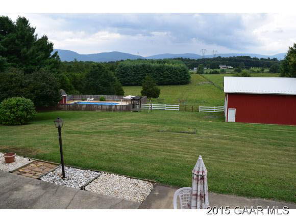 739 Cattle Scales Road Waynesboro, VA 22980 - Photo 3 of 36 a view of a lake with a yard