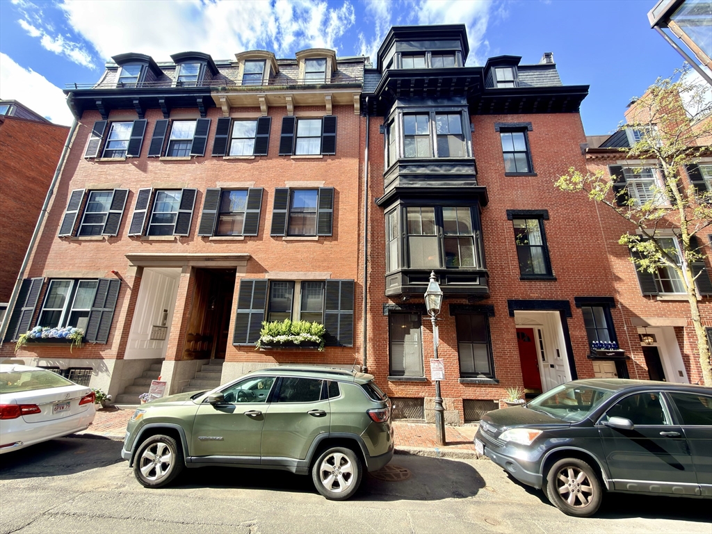 41 Pinckney Street, Unit B Boston, MA 02114 - Photo 1 of 31 a car parked in front of a building