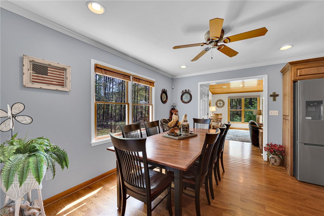 1010 Ridgeview Drive Pendleton, SC 29670 - Photo 11 of 47 This inviting dining area features ample natural light, creating a bright and airy atmosphere.