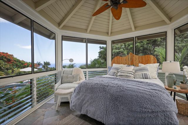 swimming pool view with a seating space