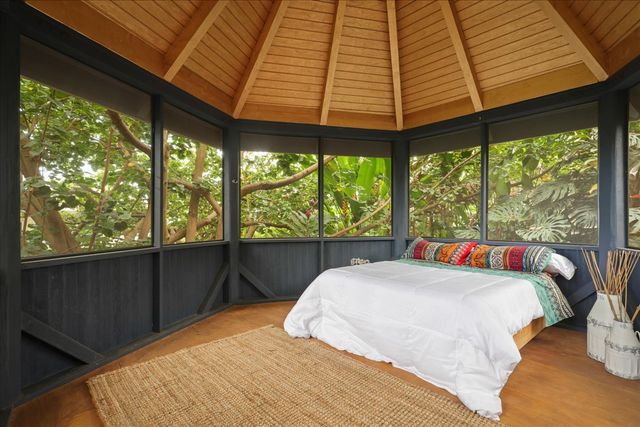 a view of a yard with swimming pool