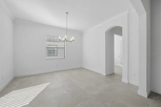 a view of empty room with windows