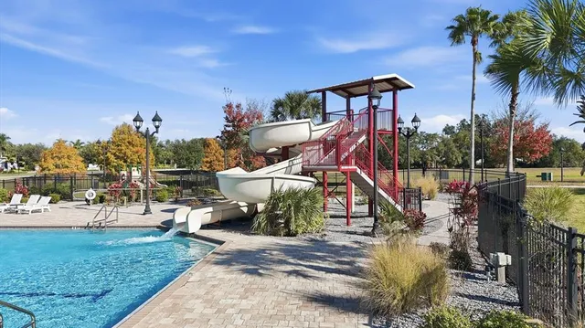a view of a swimming pool and outdoor space