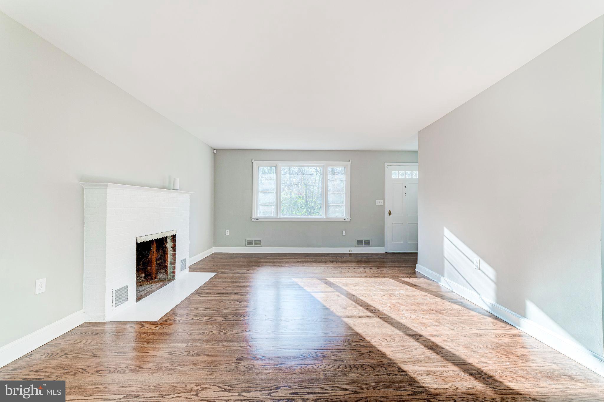 7219 Tanager Street Springfield, VA 22150 - Photo 11 of 55 Living Room with Cozy fireplace
