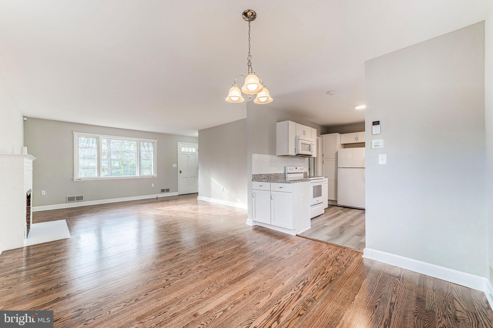 7219 Tanager Street Springfield, VA 22150 - Photo 14 of 55 Dining Room looking out to kitchen and LR