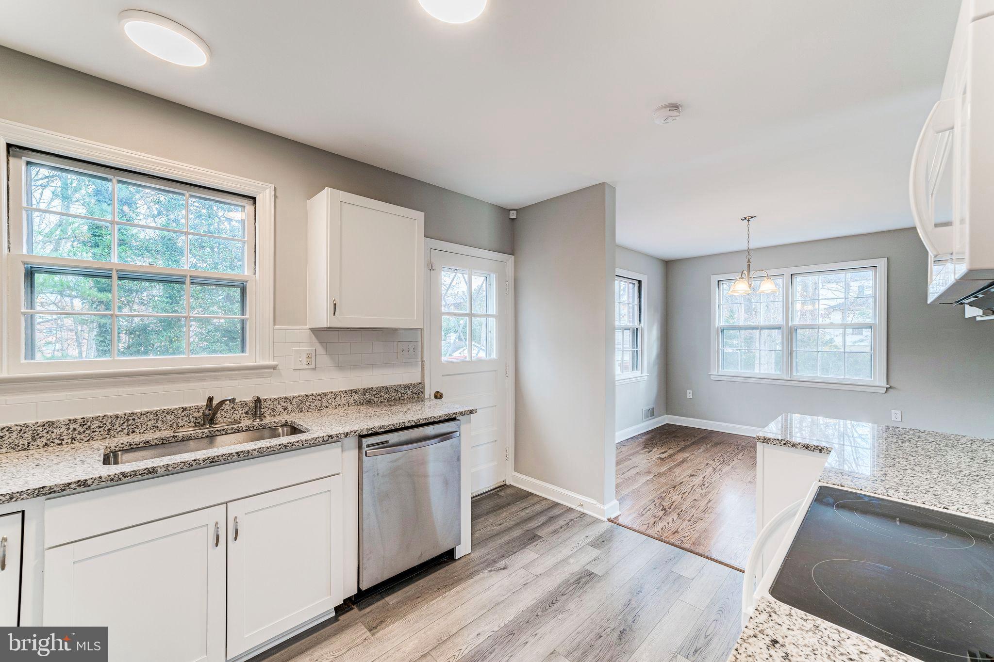 7219 Tanager Street Springfield, VA 22150 - Photo 21 of 55 Beautifully Renovated Kitchen Open to DR