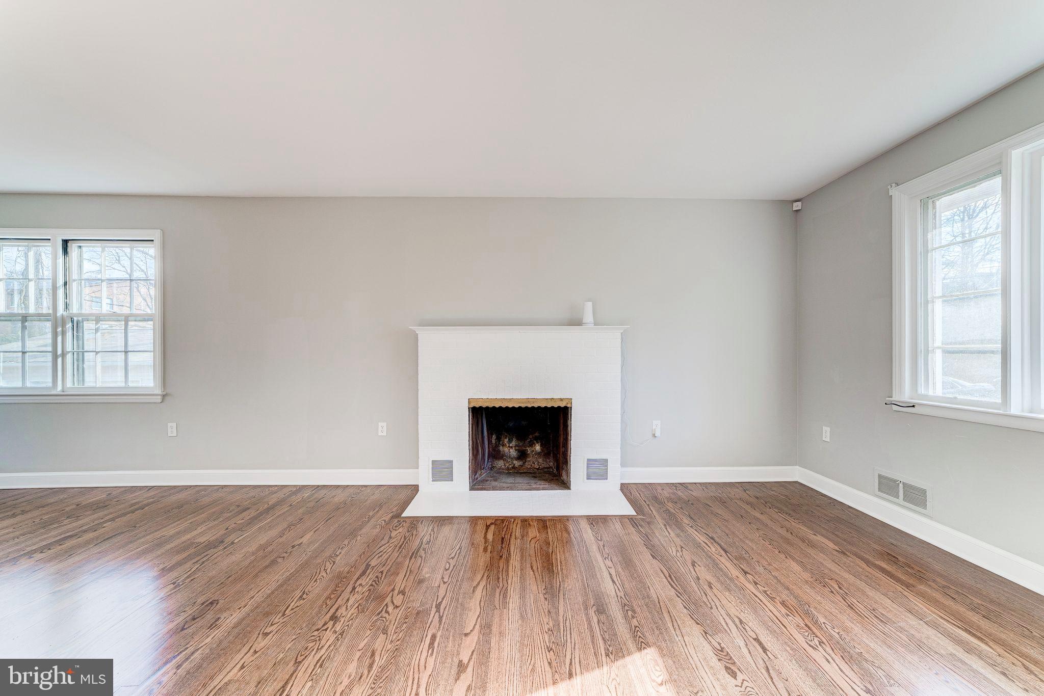 7219 Tanager Street Springfield, VA 22150 - Photo 7 of 55 Living Room with Cozy fireplace