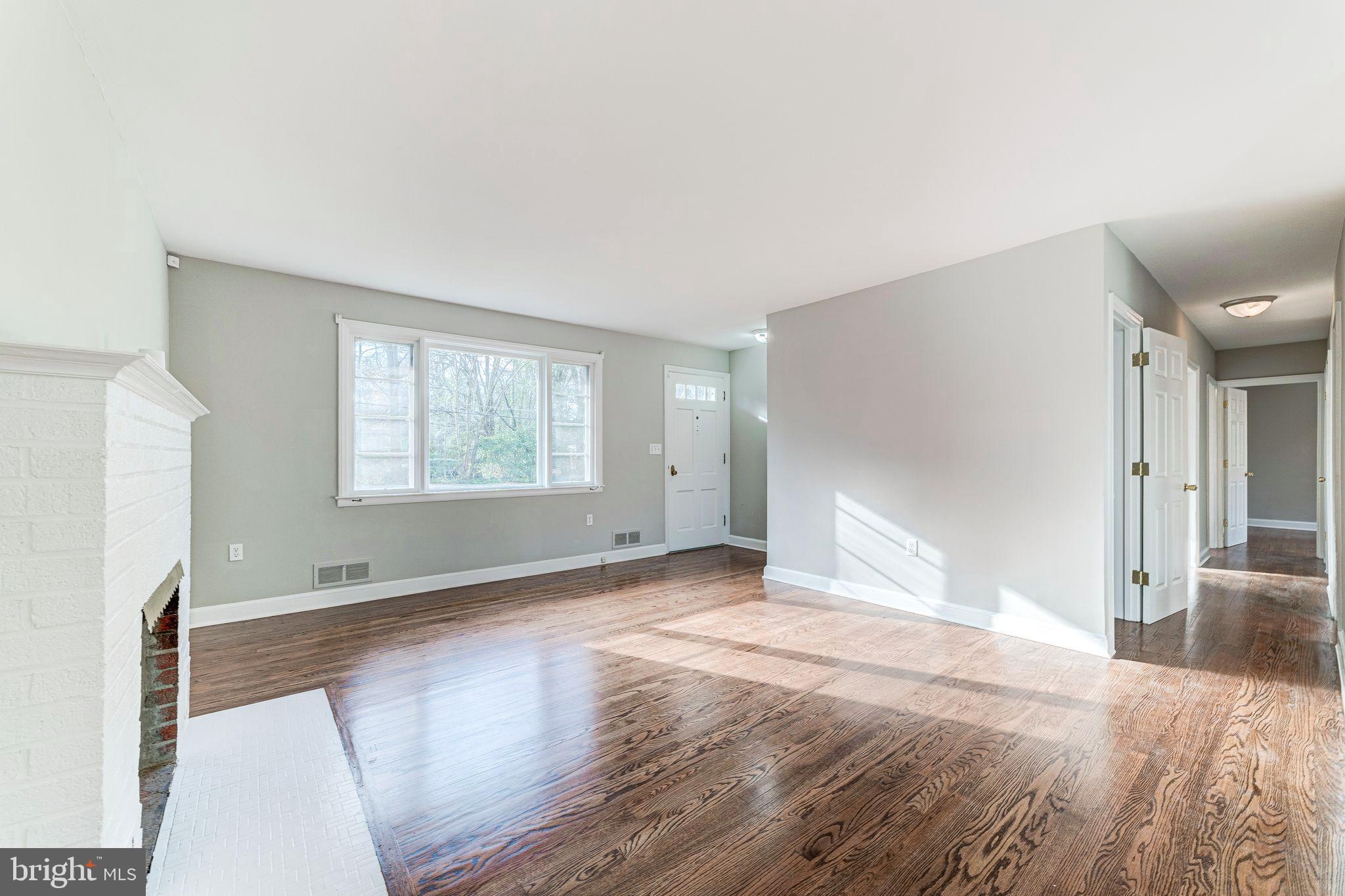 7219 Tanager Street Springfield, VA 22150 - Photo 10 of 55 Living Room with Cozy fireplace