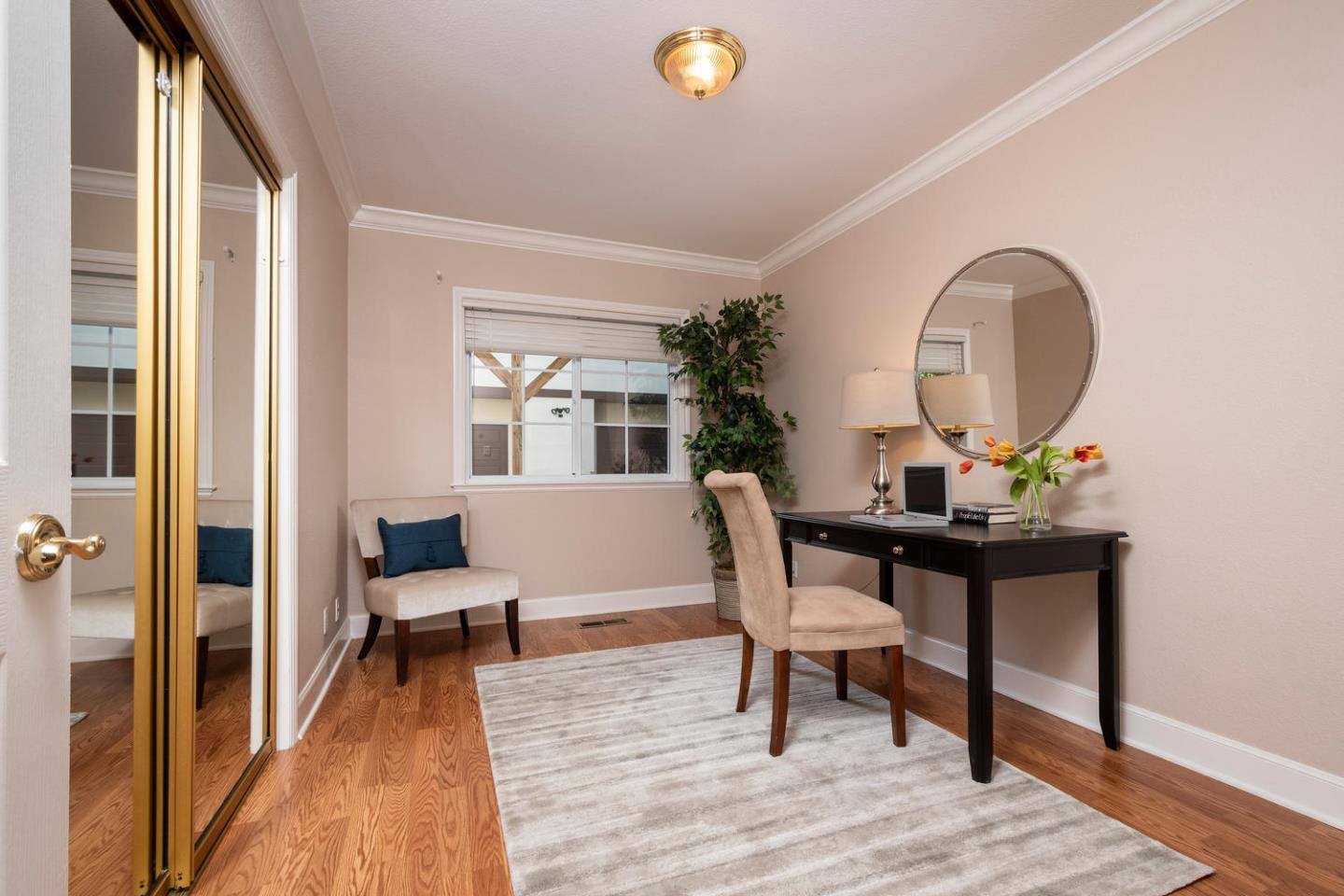 914 Palm Avenue San Mateo, CA 94401 - Photo 11 of 24 a view of a workspace room with wooden floor and furniture
