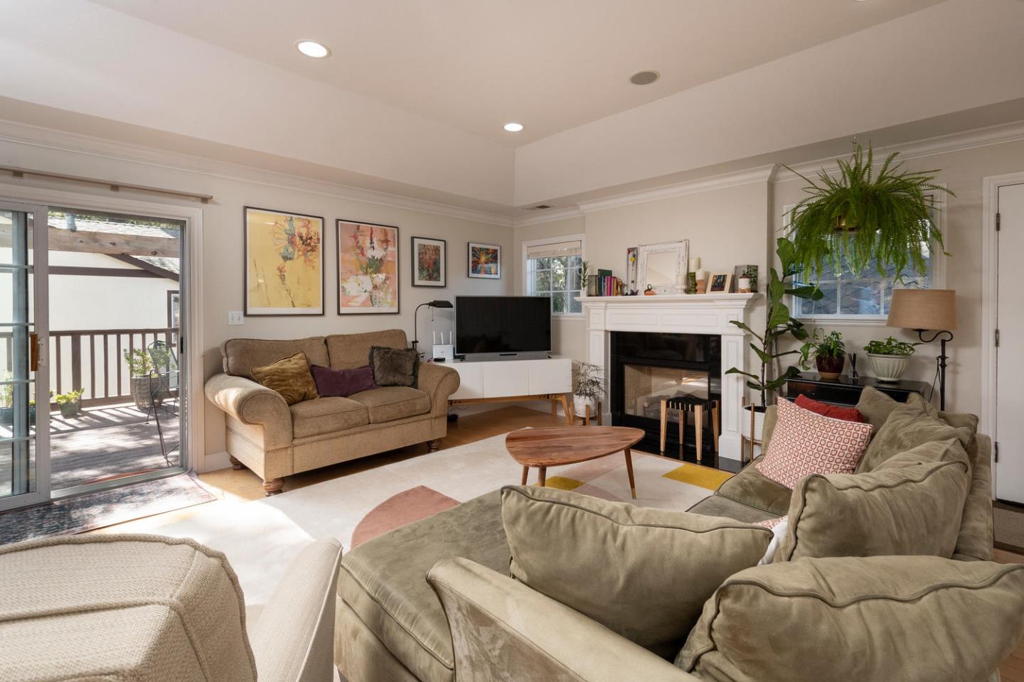 914 Palm Avenue San Mateo, CA 94401 - Photo 15 of 24 a living room with furniture a fireplace and a flat screen tv