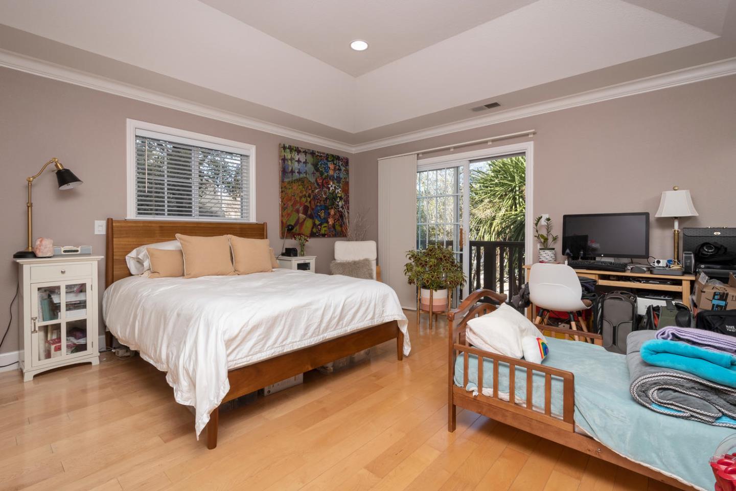 914 Palm Avenue San Mateo, CA 94401 - Photo 17 of 24 a bedroom with a bed and a window