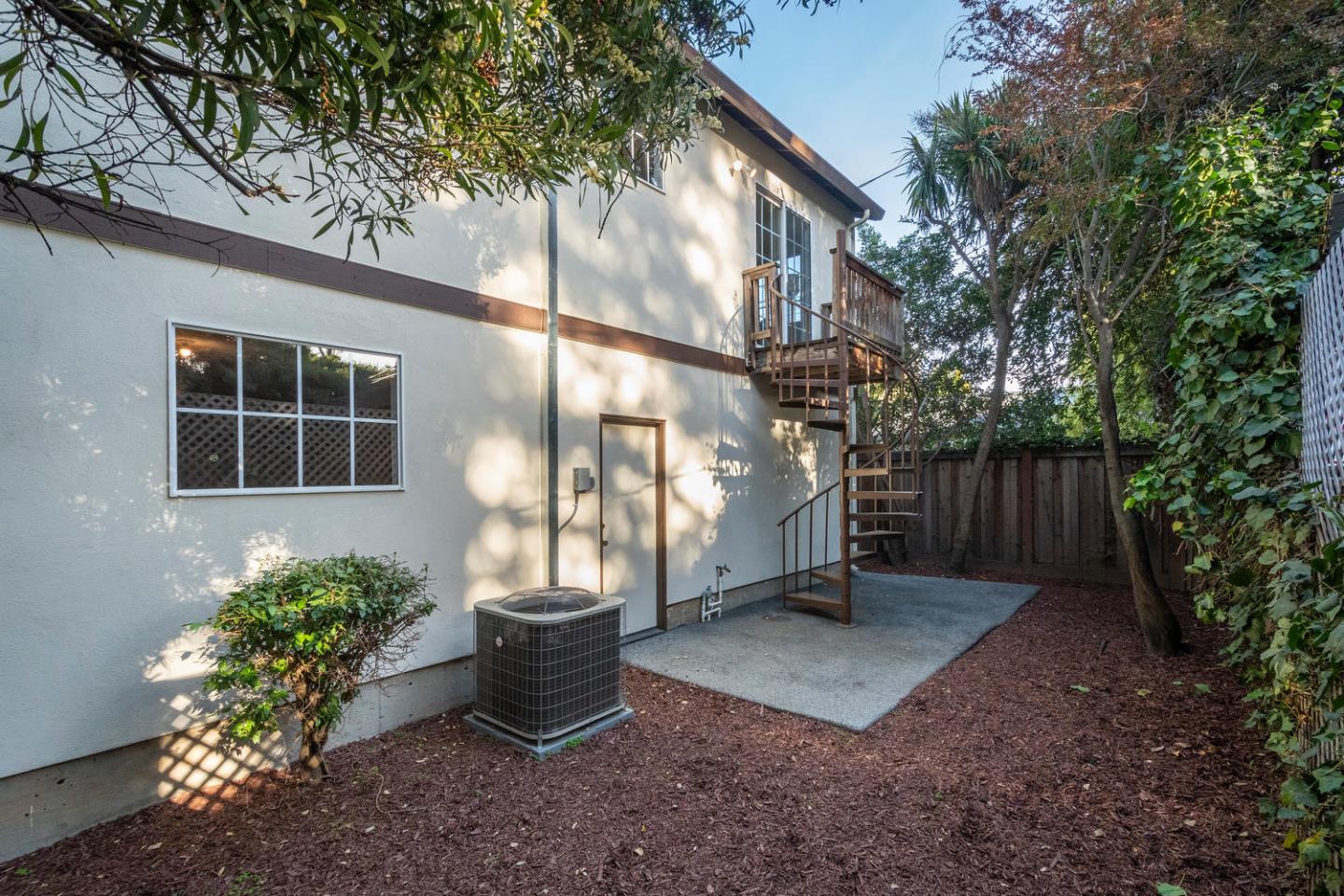 914 Palm Avenue San Mateo, CA 94401 - Photo 5 of 24 a backyard of a house with lots of green space