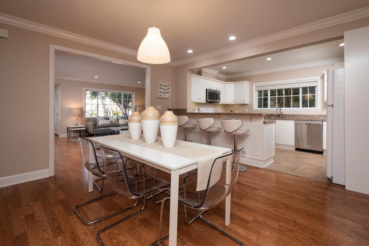 914 Palm Avenue San Mateo, CA 94401 - Photo 8 of 24 a view of a dining room with furniture and wooden floor