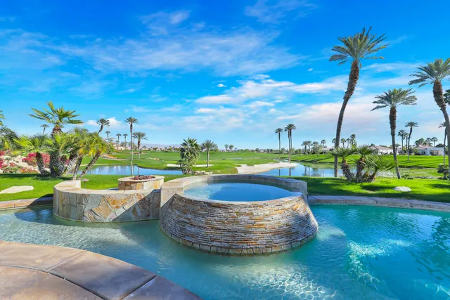 a view of a swimming pool with a garden