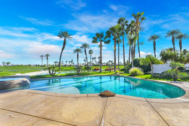 a view of swimming pool with a patio