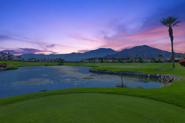 a view of a lake with a mountain in the background