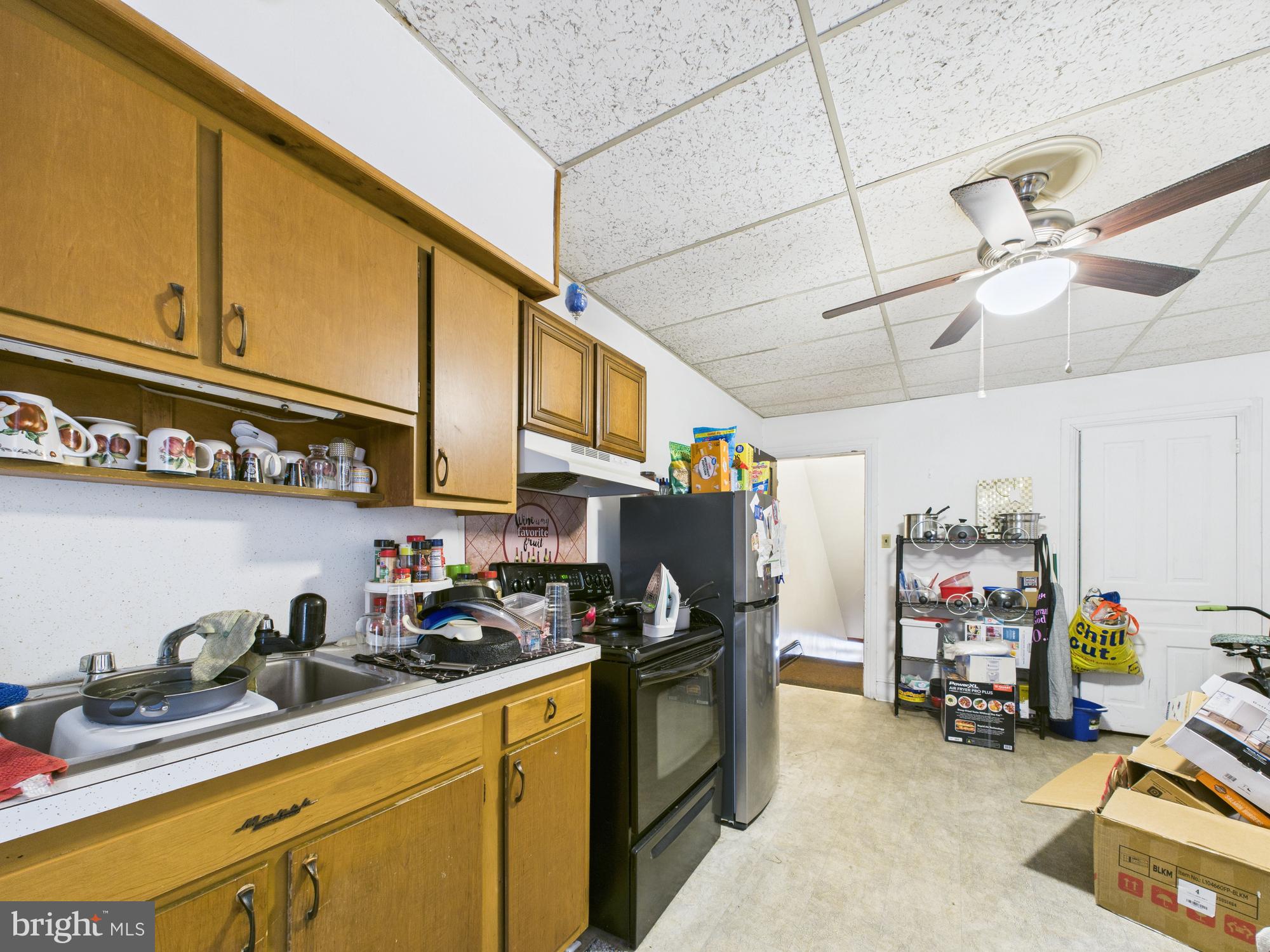 828 West Princess Street York, PA 17401 - Photo 16 of 32 a kitchen with storage and utility