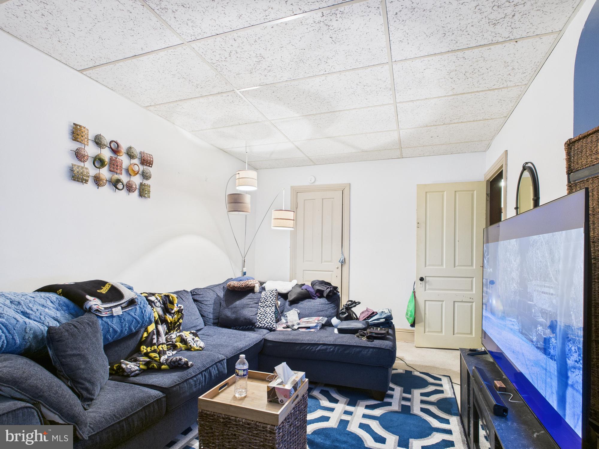 828 West Princess Street York, PA 17401 - Photo 21 of 32 a living room with furniture and a couch