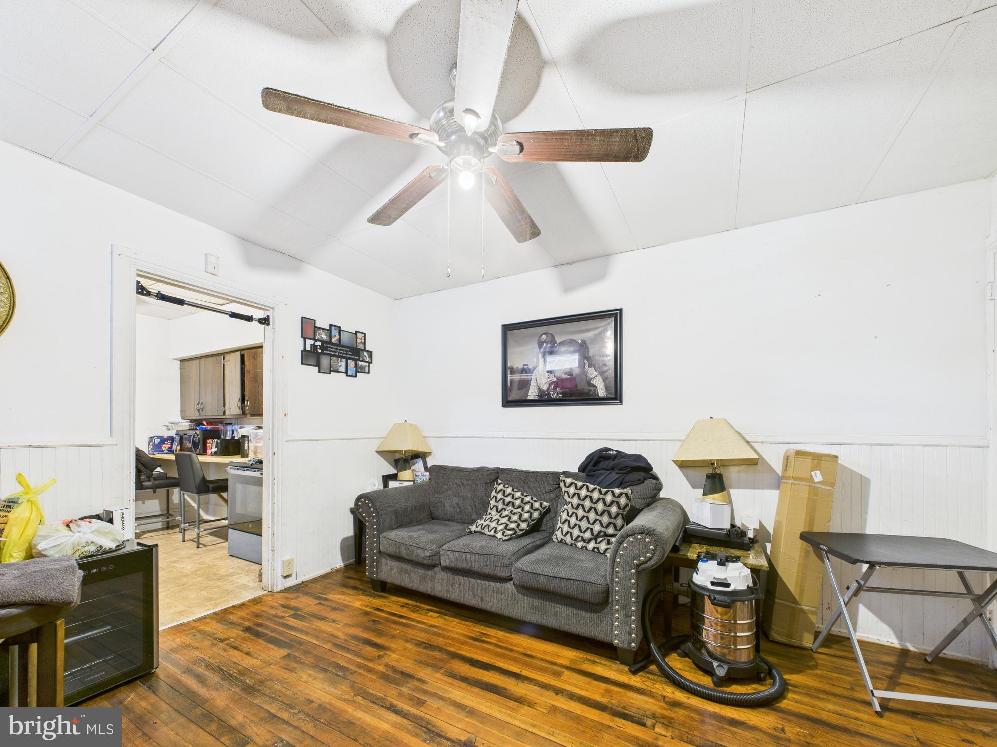 828 West Princess Street York, PA 17401 - Photo 10 of 32 a living room with furniture and wooden floor