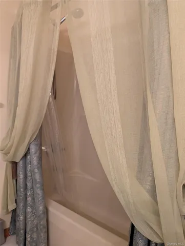 a view of a hallway with staircase