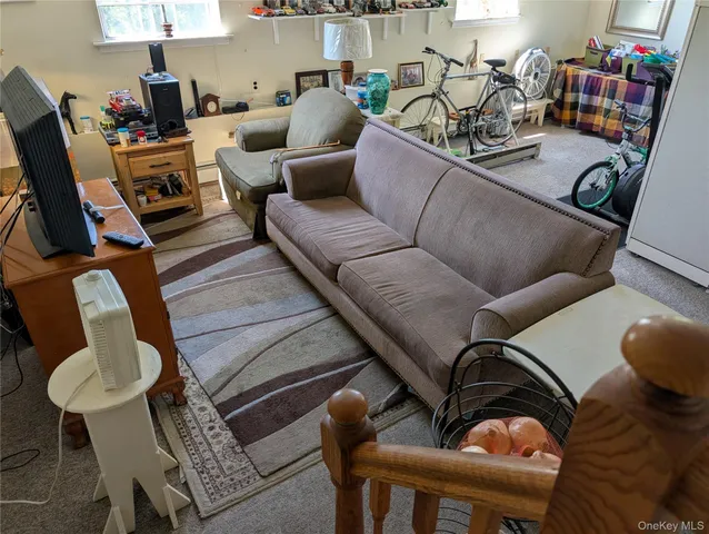 a backyard of a house with a yard and outdoor seating