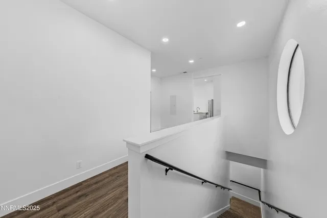 a view of entryway with wooden floor