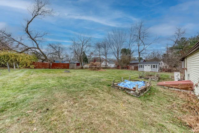 a childrens park with lots of swings and slides